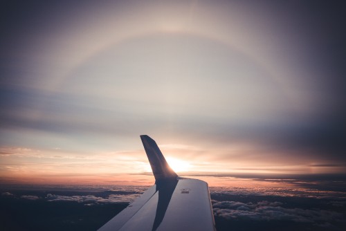 Image white and black airplane wing during daytime