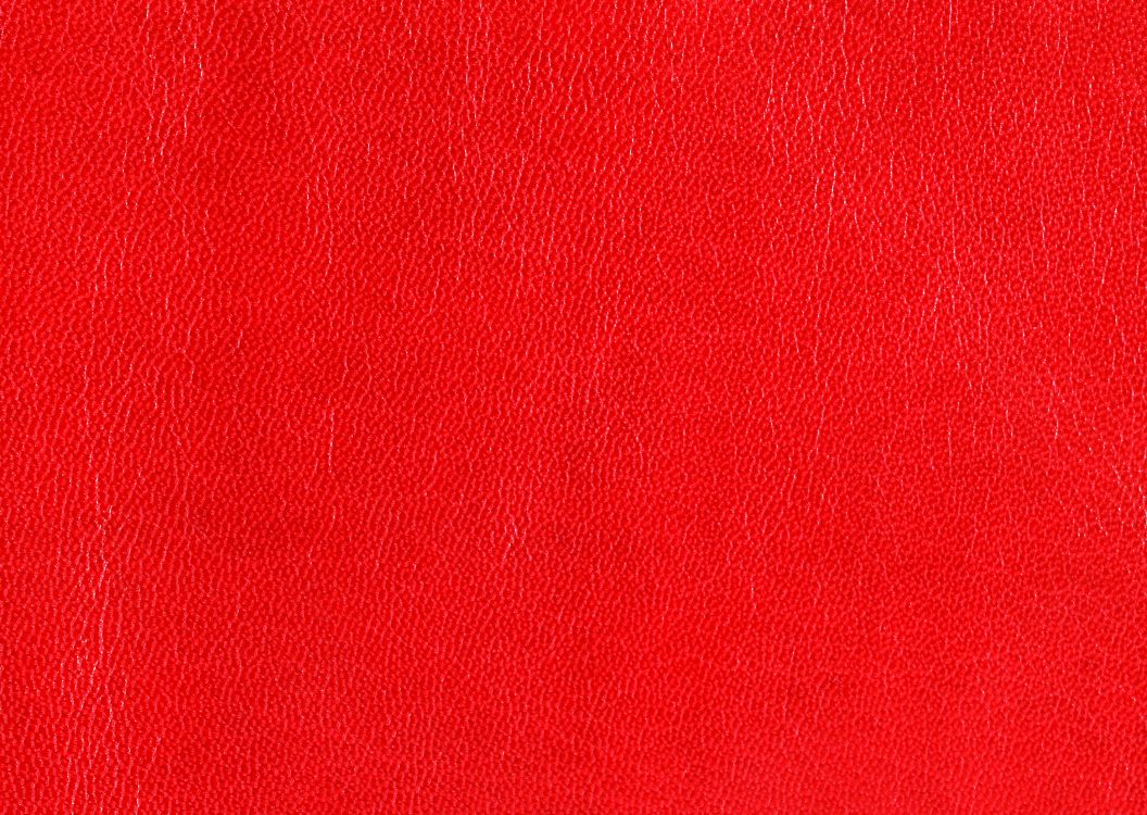 red textile in close up photography