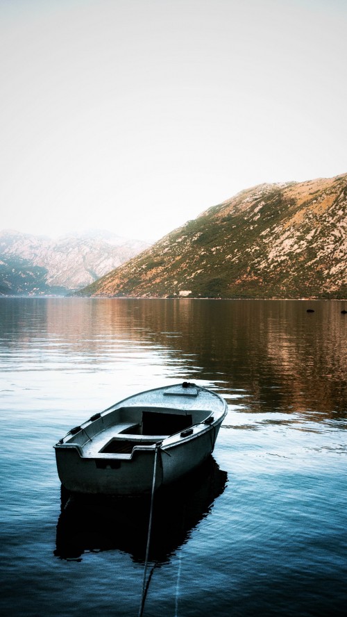 Image reflection, water, transformation, boat, mountain