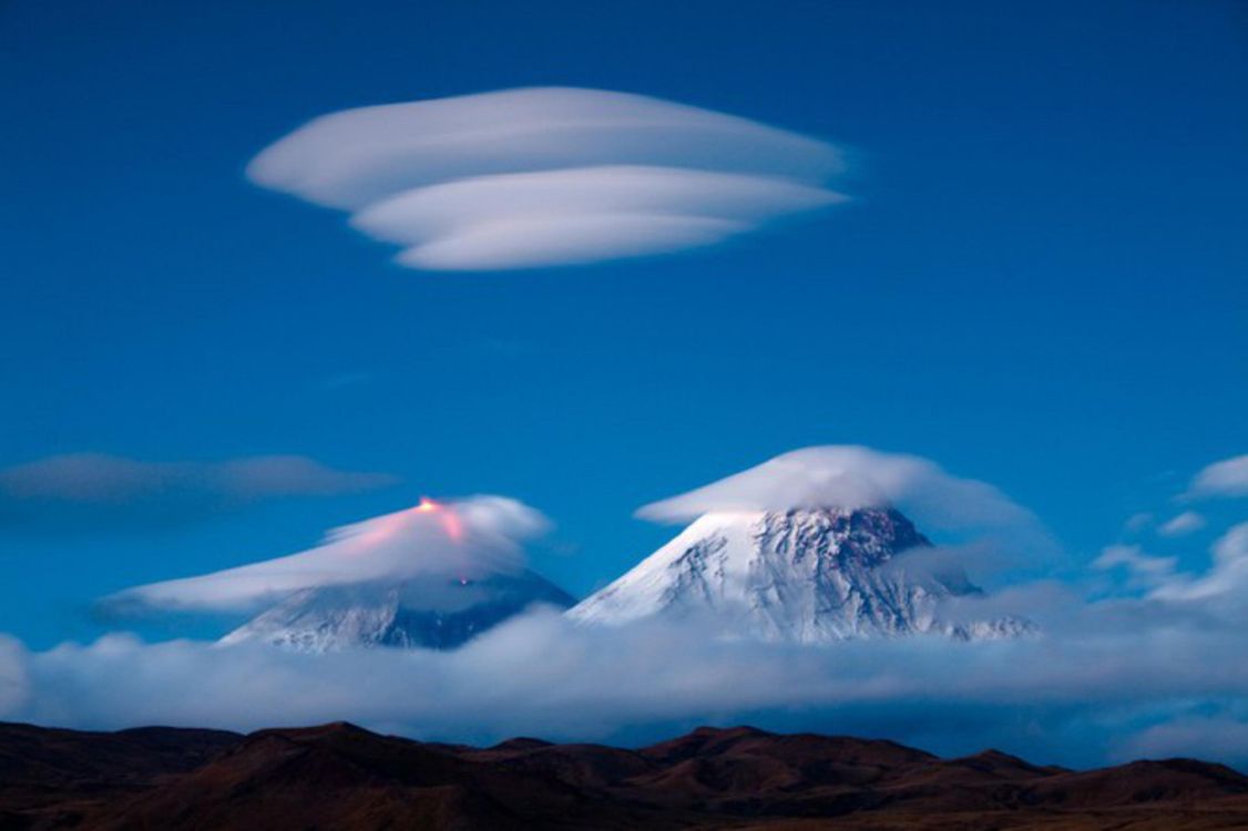 snow covered mountain under blue sky during daytime