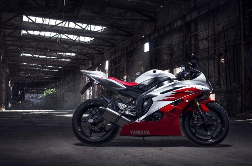 Image red and black sports bike parked on tunnel