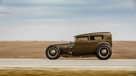 Image brown vintage car on brown field during daytime