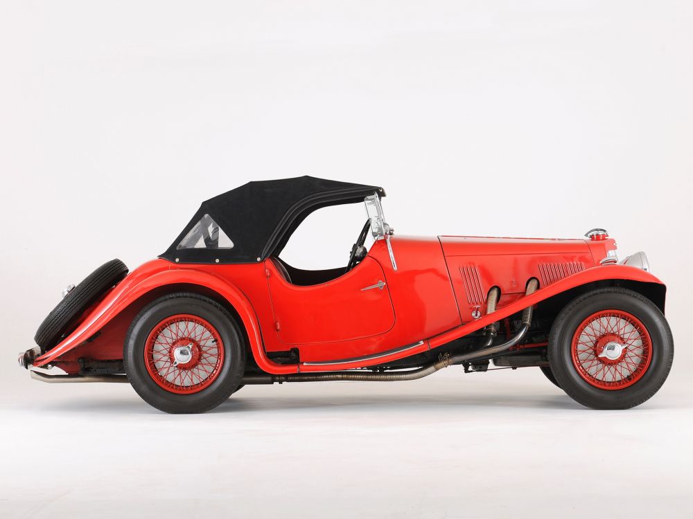 red vintage car on white snow