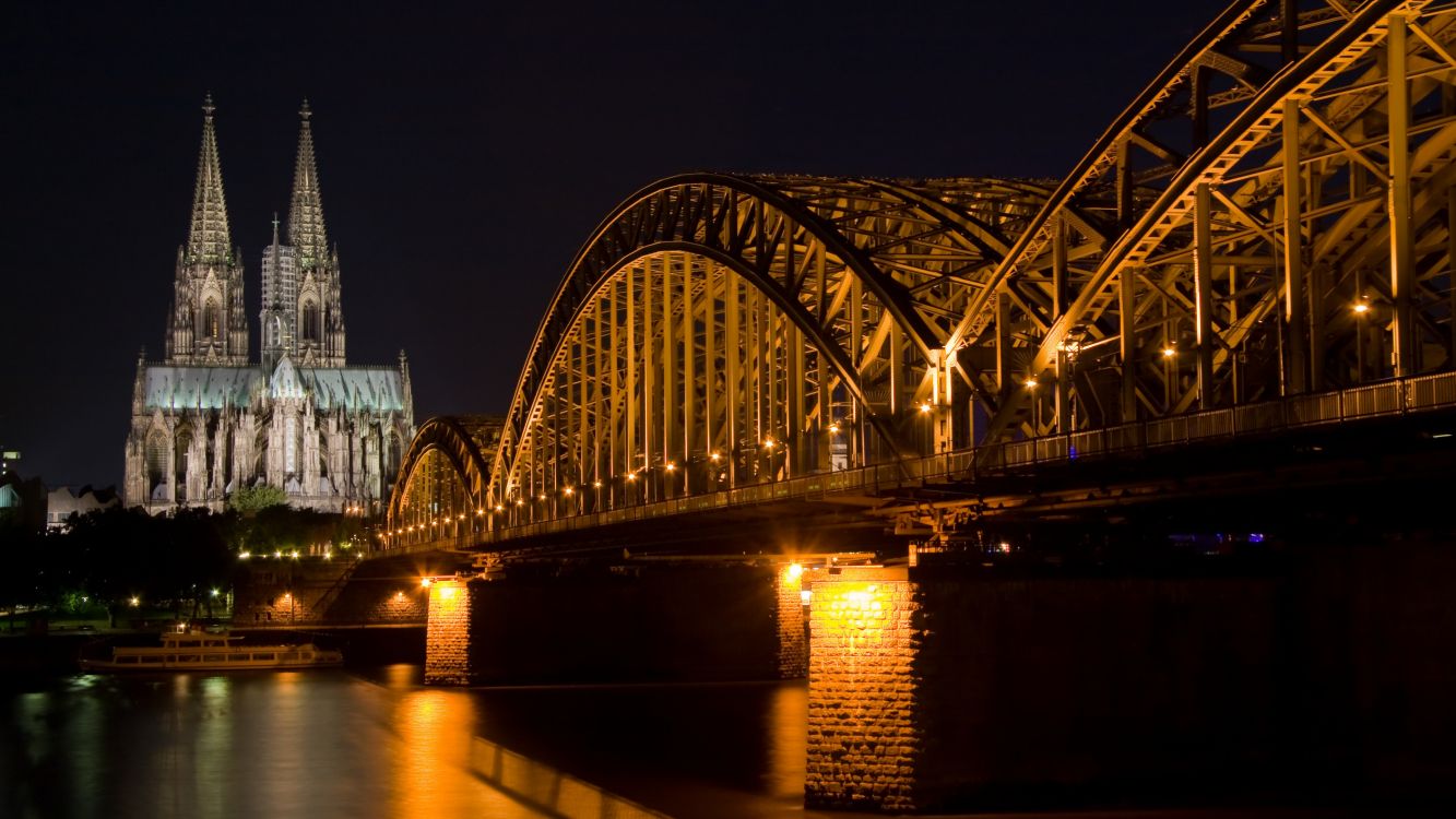 bridge over water during night time