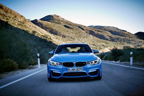 Image blue bmw car on road during daytime