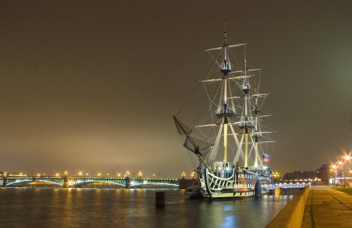 Image ship on dock during night time