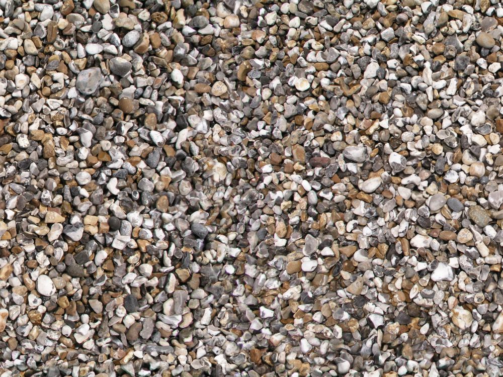 brown and white pebbles on ground