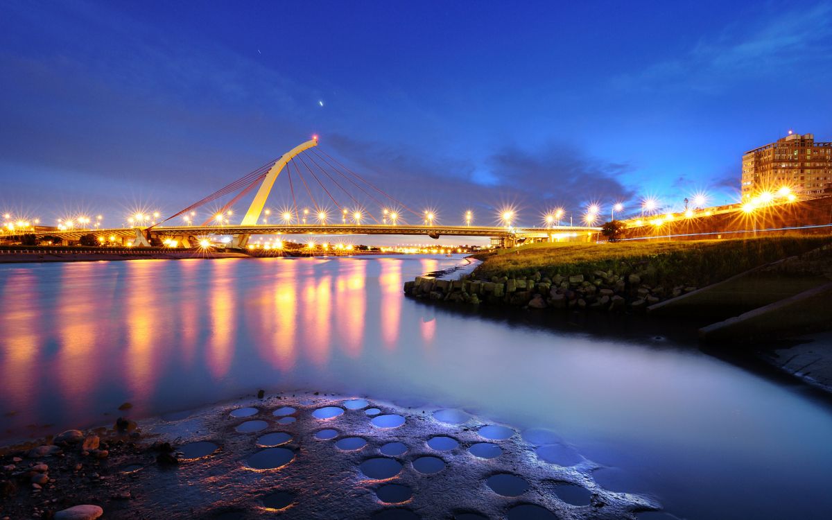 Bridge Over Water During Night Time. Wallpaper in 2560x1600 Resolution