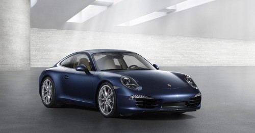 Image blue porsche 911 parked in a white room