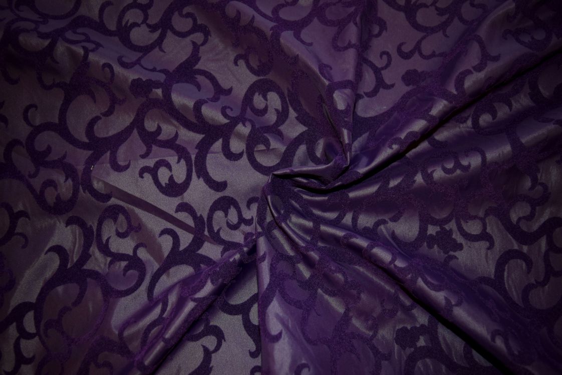 purple and white floral textile