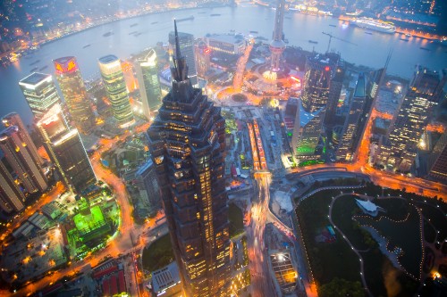 Image aerial view of city buildings during night time