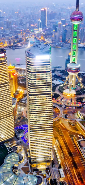 Image aerial view of city buildings during night time