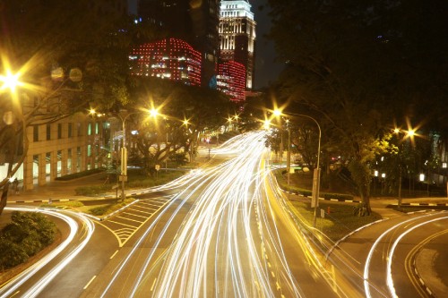 Image time lapse photography of cars on road during night time