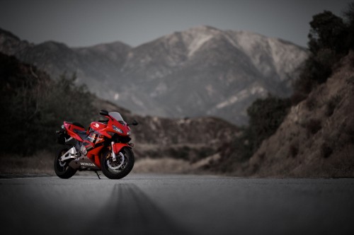 Image red and black sports bike on road during daytime