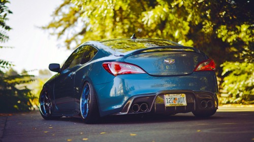 Image blue porsche 911 parked on road during daytime