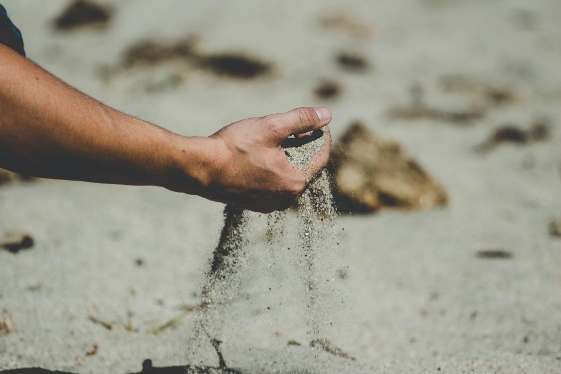 persons left hand on water