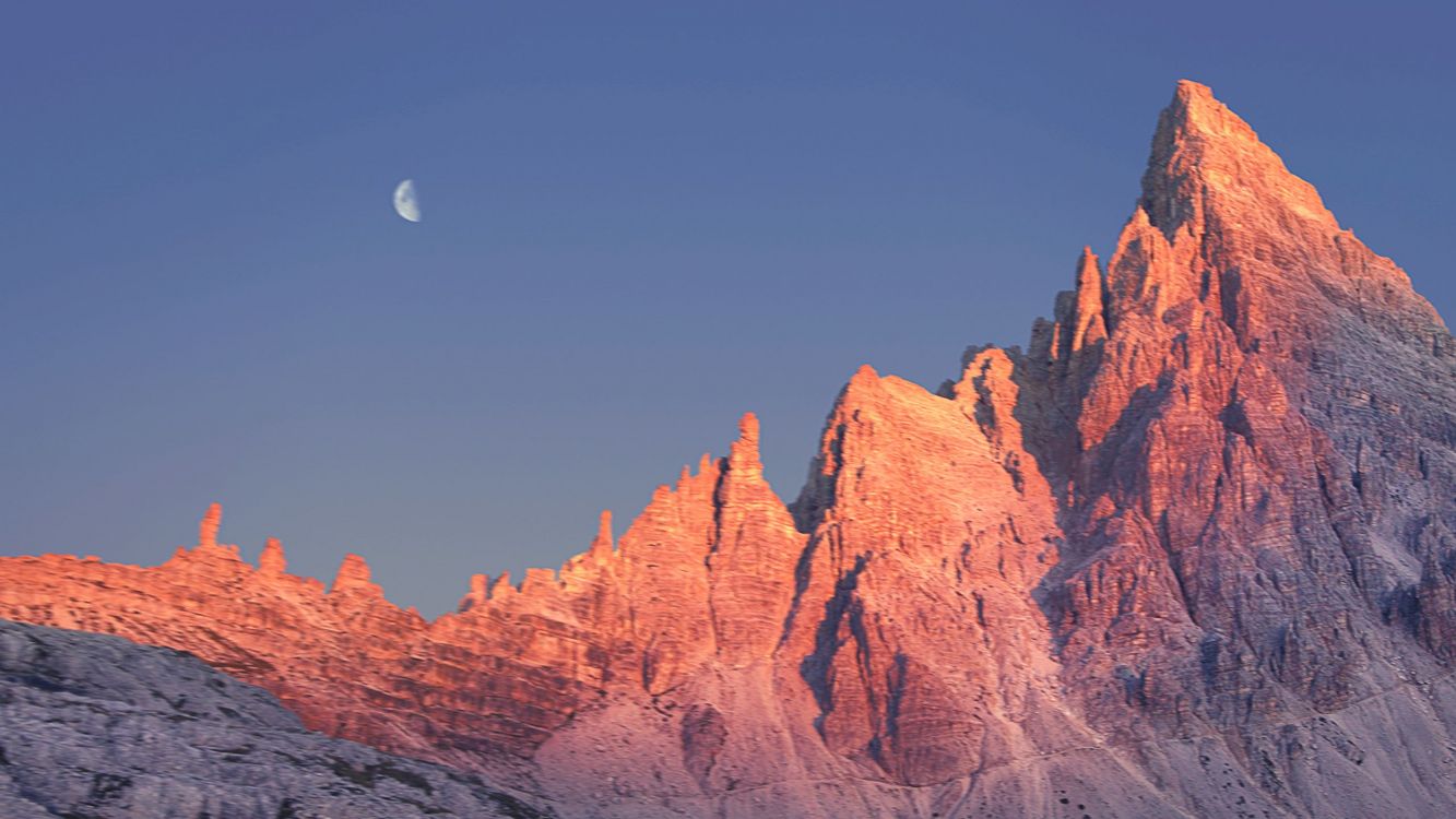 brown rocky mountain under blue sky during daytime