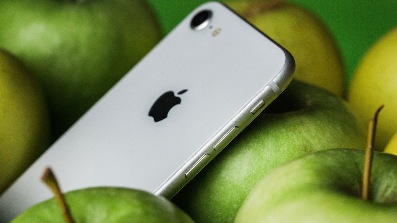 silver iphone 6 on green textile