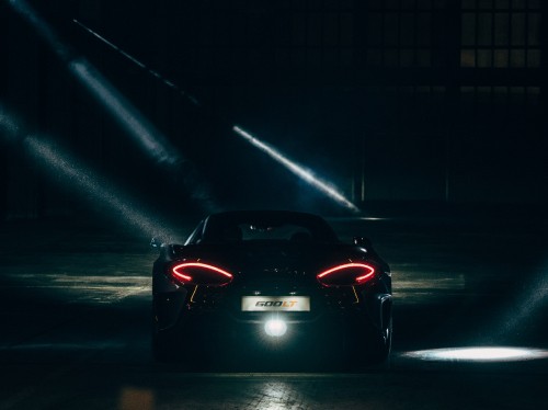 Image red ferrari sports car on road during nighttime