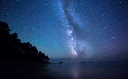 Image body of water under starry night