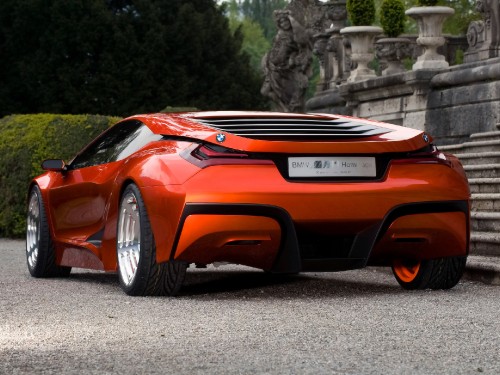 Image orange car on road during daytime