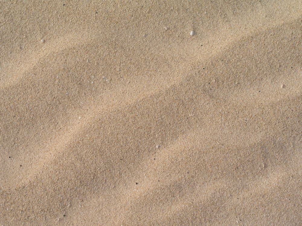 Brown Sand With Shadow of Person. Wallpaper in 2560x1920 Resolution