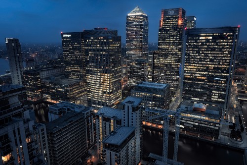 Image high rise buildings during night time