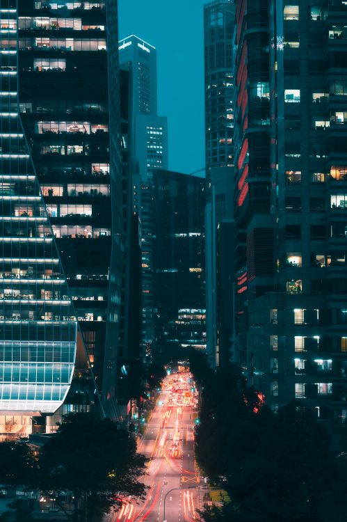 People Walking on Street During Night Time. Wallpaper in 3933x5900 Resolution