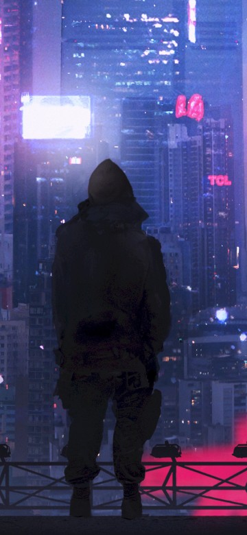 Image man in black hoodie standing on the top of the building during night time