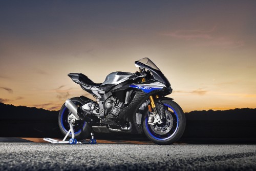 Image black sports bike on gray asphalt road during daytime