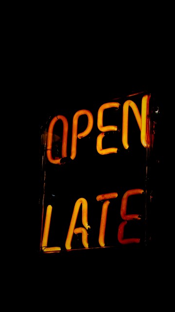 Image orange and black open neon light signage
