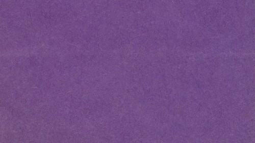 Image purple textile on brown wooden table