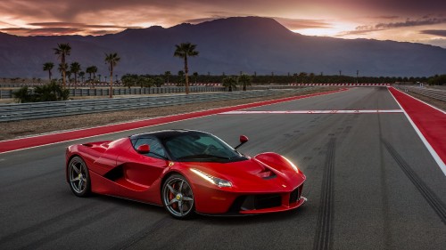 Image red ferrari 458 italia on road during daytime