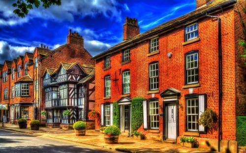 Image brown brick building under blue sky