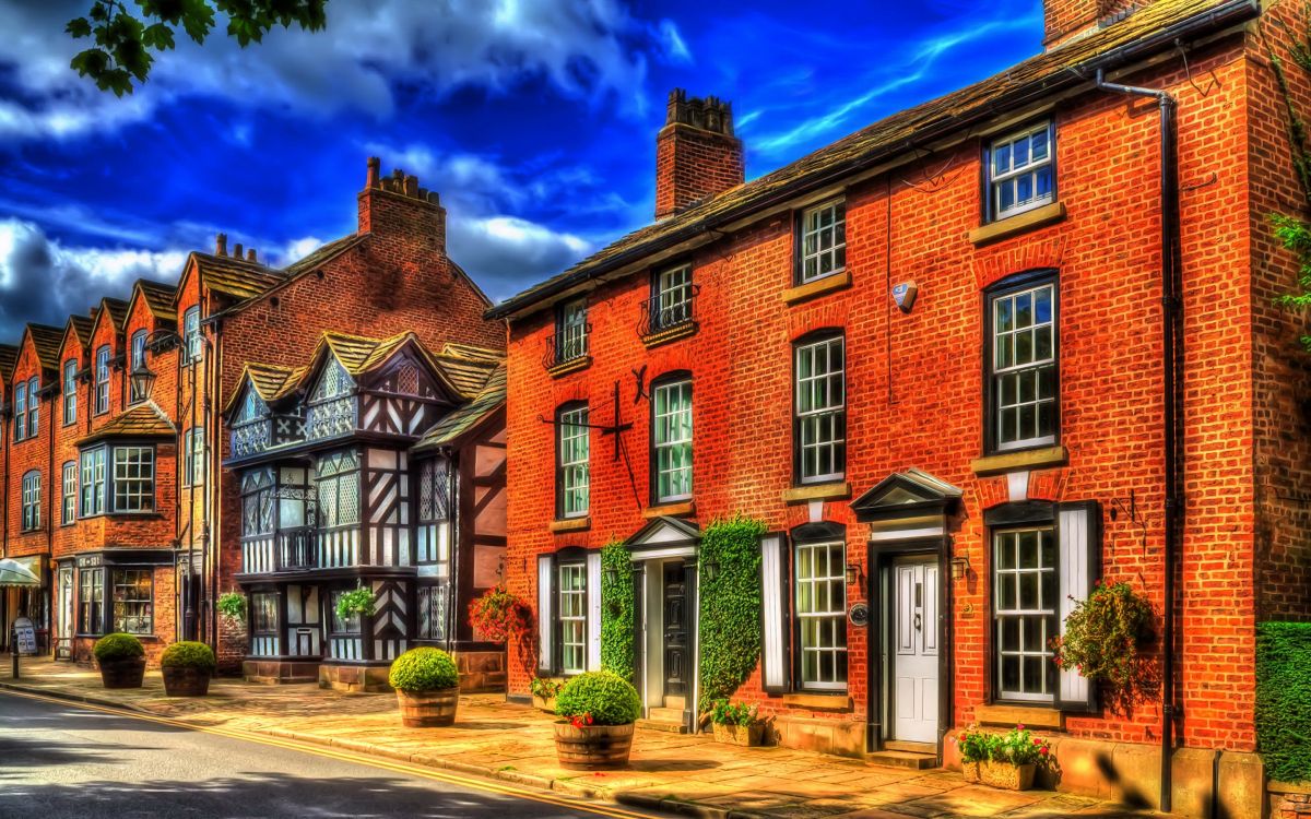 brown brick building under blue sky