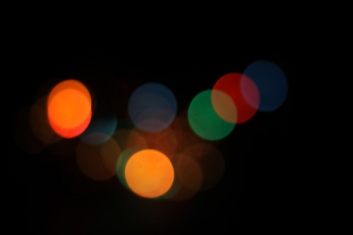 Image orange and green bokeh lights