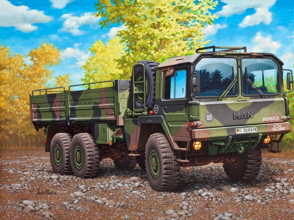 green and brown camouflage military truck on brown soil during daytime