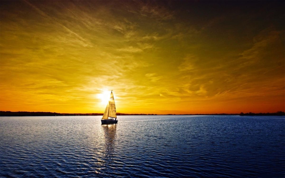 Segelboot Auf Dem Meer Bei Sonnenuntergang. Wallpaper in 1920x1200 Resolution