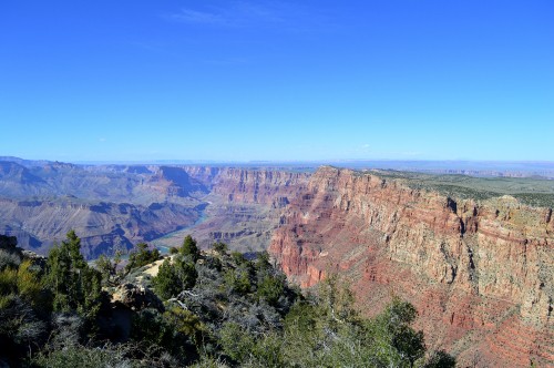 Image brown rocky mountain under blue sky during daytime