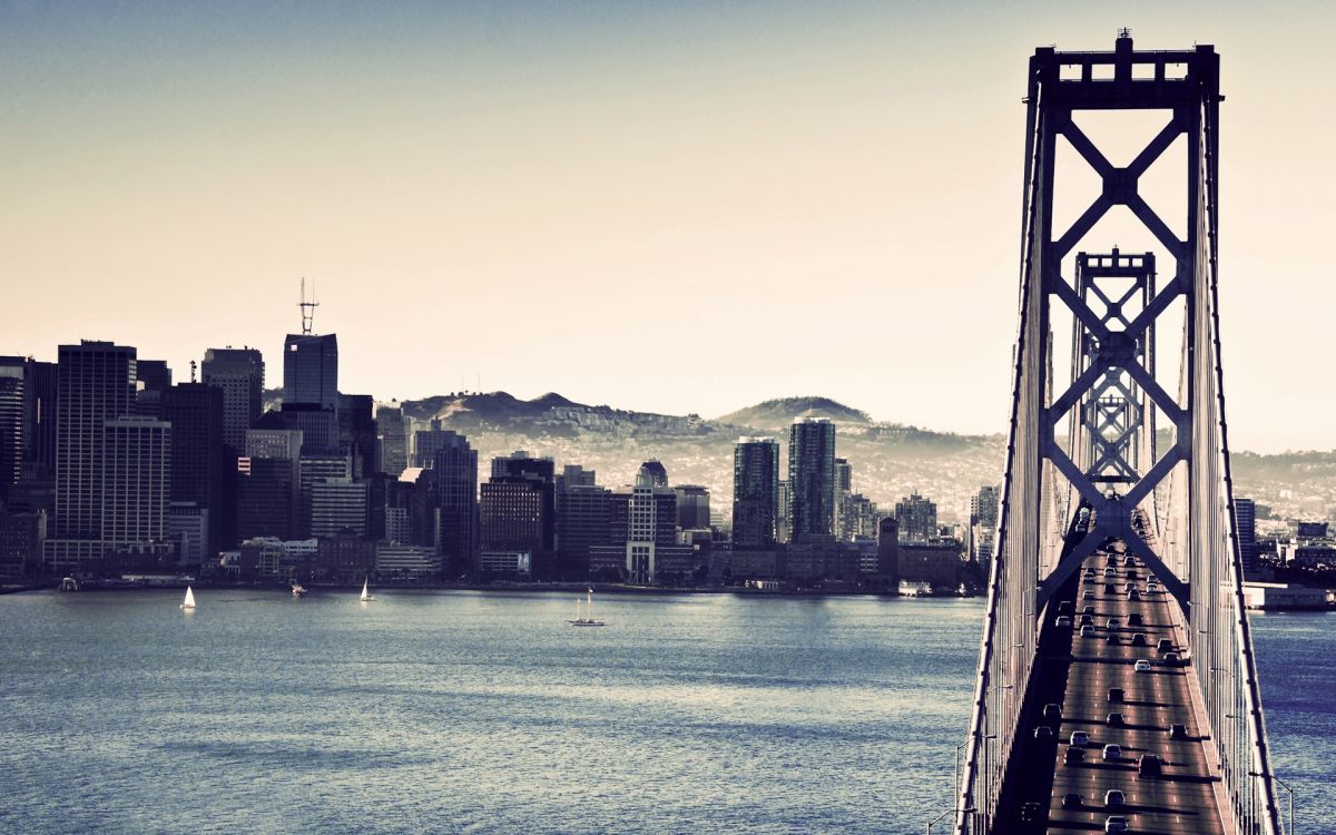 city skyline across body of water during daytime