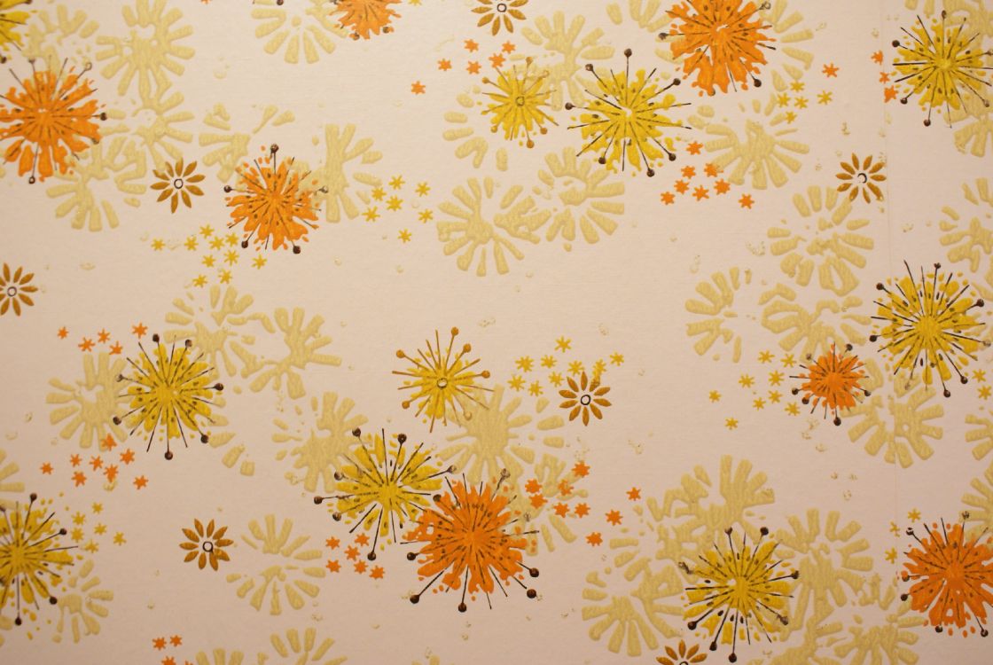 white and yellow floral textile