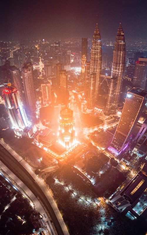 Image aerial view of city buildings during night time