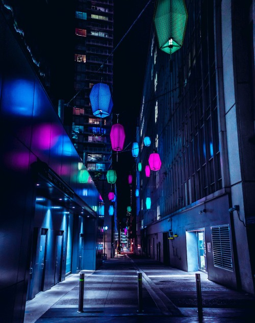 Image blue and green lantern on street during night time