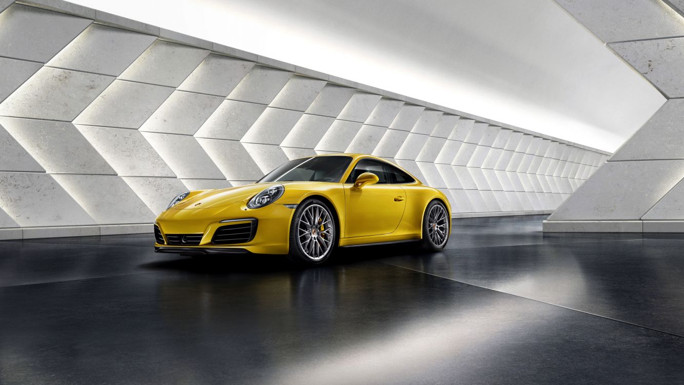 Gelber Porsche 911 Auf Grauem Betonpflaster Geparkt. Wallpaper in 3200x1800 Resolution