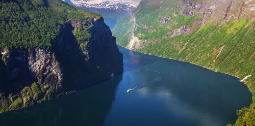 Image aerial view of lake between mountains during daytime