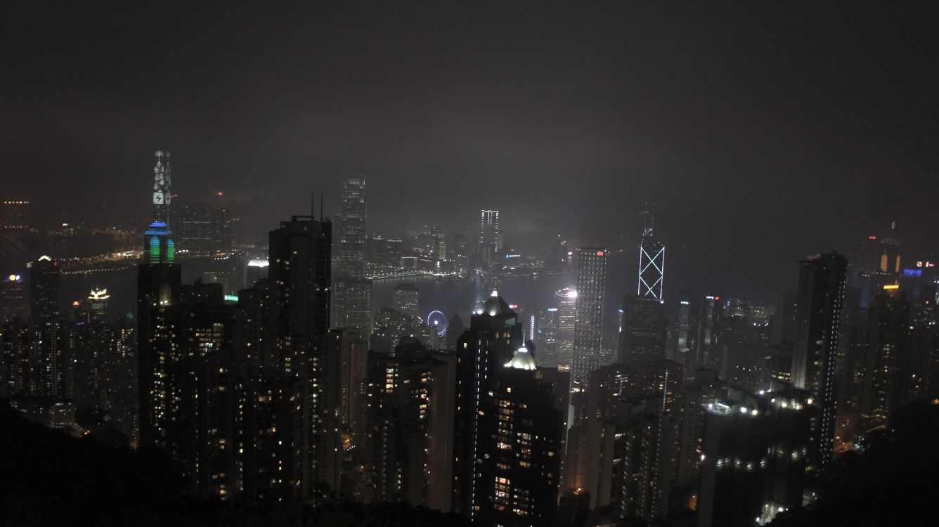 city skyline during night time