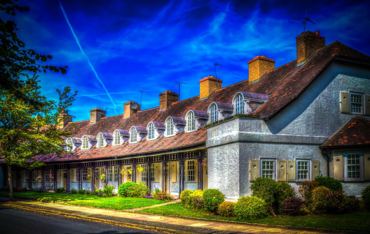 Edificio de Hormigón Marrón y Blanco Bajo un Cielo Azul Durante el Día. Wallpaper in 3000x1900 Resolution