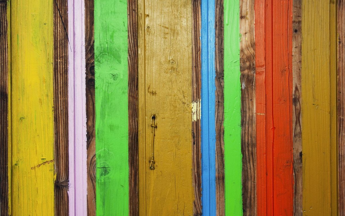 green yellow and red wooden wall