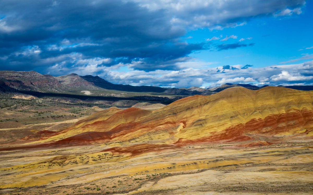 brown and gray mountains under blue sky during daytime