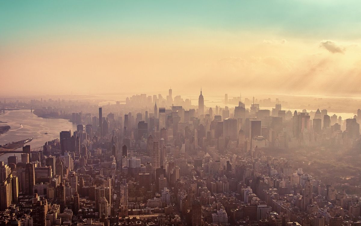 aerial view of city buildings during sunset